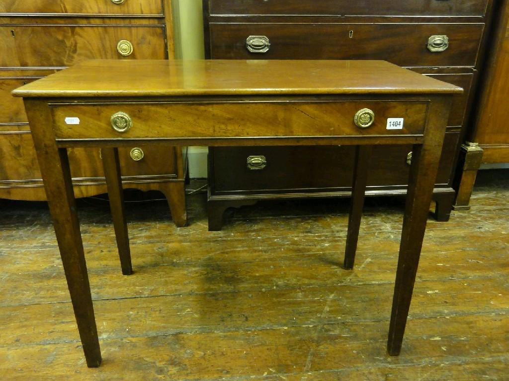 Appraisal: A Georgian mahogany side table fitted with a shallow frieze