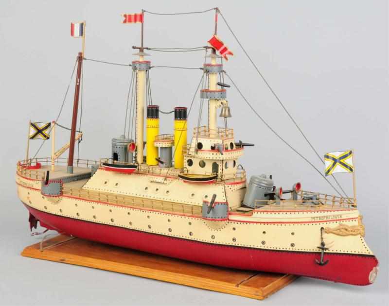 Appraisal: Hand-Painted Tin Petropavlovsk Boat Toy Contemporary Two-stack battleship with name