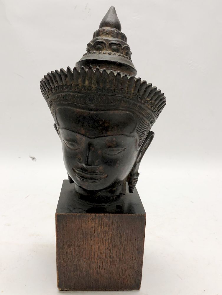 Appraisal: Indian Bronze wearing Pyramidal Headdress On wooden base H x