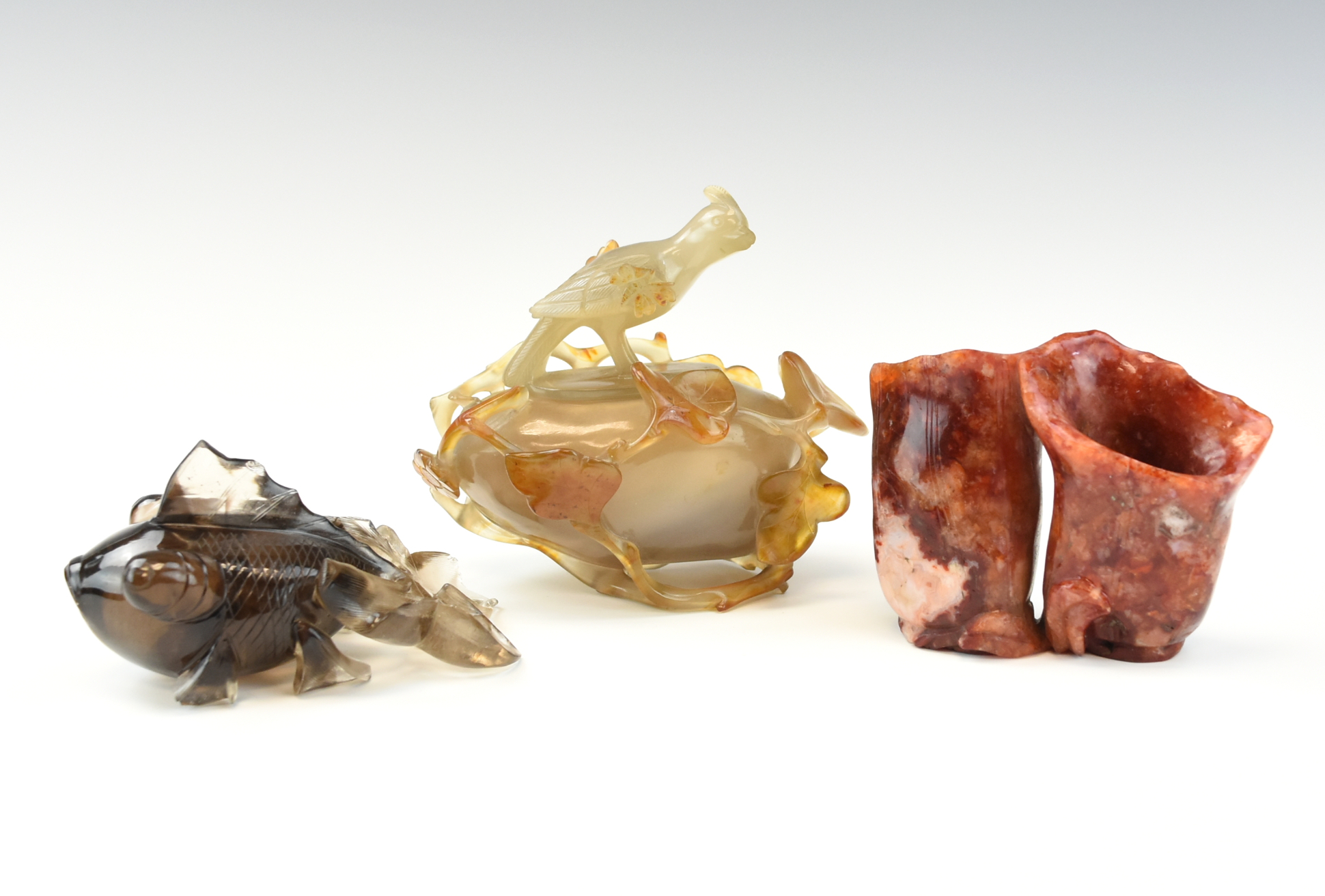 Appraisal: SET OF CHINESE AGATE CRYSTAL SOAPSTONE ORNAMENTS with floral sprigs