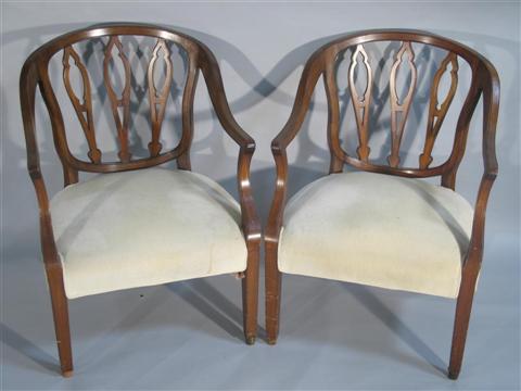 Appraisal: PAIR OF HEPPLEWHITE STYLE MAHOGANY ARMCHAIRS th century the shaped