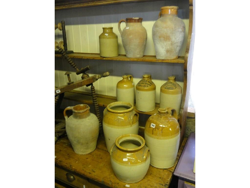 Appraisal: A collection of stoneware flagons and jars to include an