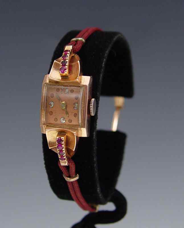 Appraisal: LADIES K ROSE GOLD ART DECO WATCH WITH RUBIES Solid