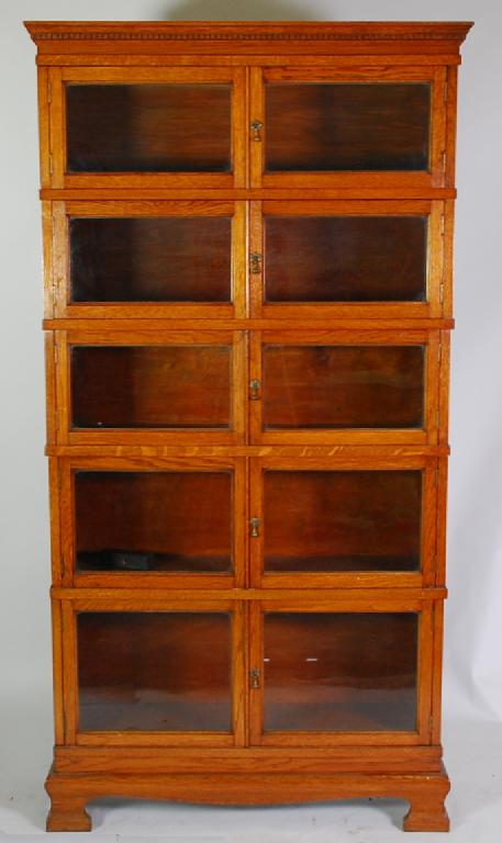 Appraisal: EARLY TWENTIETH CENTURY FIVE SECTION 'SIMPOLES' STACKING OAK 'CHAPTER BOOKCASE'