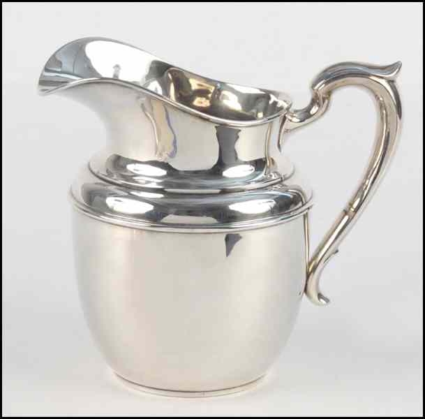 Appraisal: AMERICAN STERLING SILVER WATER PITCHER Bearing an engraved ''K'' ''