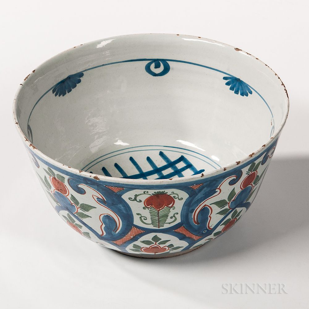 Appraisal: Polychrome Decorated Tin-glazed Earthenware Punch Bowl Polychrome Decorated Tin-glazed Earthenware