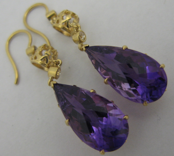 Appraisal: PAIR OF AMETHYST AND K GOLD EARRINGS each set with