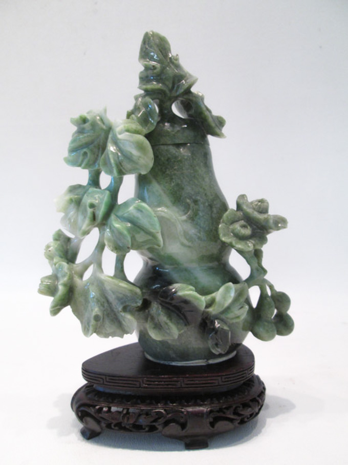 Appraisal: CHINESE CARVED JADE URN on hardwood plinth The lidded double