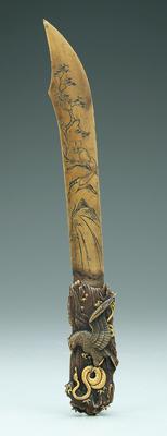 Appraisal: Japanese bronze paper knife handle with eagle attacking gilded snake