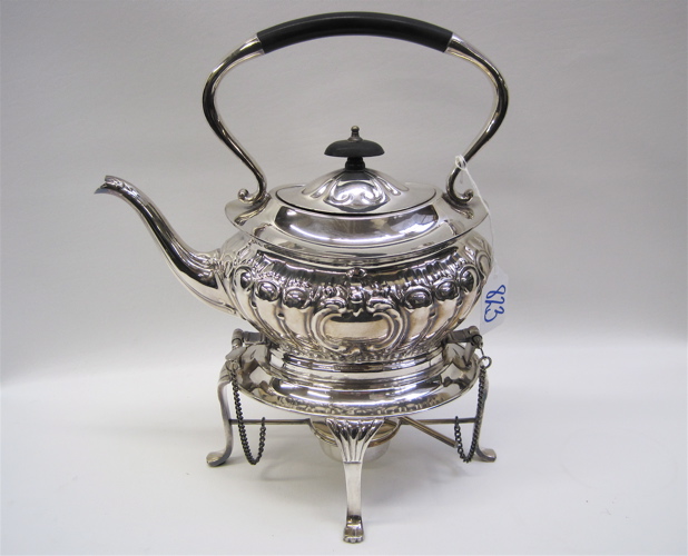 Appraisal: SHEFFIELD SILVER PLATED TEAPOT WARMING STAND teapot with ebonized wood