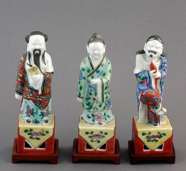 Appraisal: A group of Chinese enameled porcelains comprising a Dehua figure