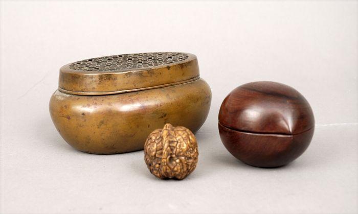 Appraisal: Japanese Copper Hand Warmer Together with a Japanese carved hardwood