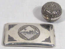 Appraisal: A silver cigarette case with Islamic scene in niello probably