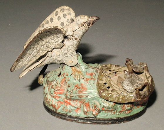 Appraisal: Cast iron mechanical bank c of an eagle and eaglets