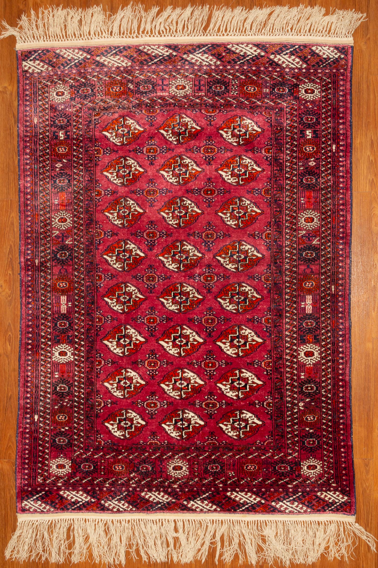 Appraisal: TURKEMAN BOKHARA X Fourth quarter- th century hand-knotted wool pile