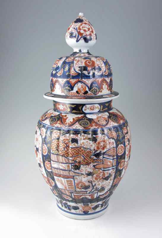 Appraisal: th C JAPANESE IMARI COVERED URN Hand painted classic iron