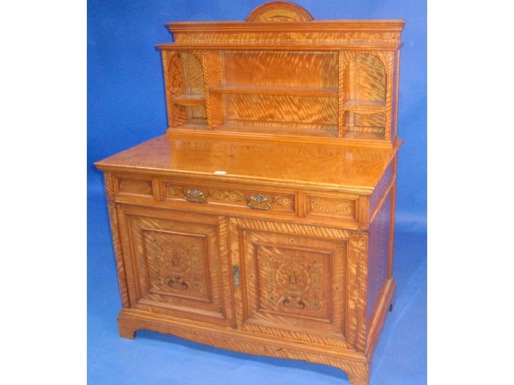 Appraisal: A fine Victorian satinwood side cabinet with raised shelf compartment