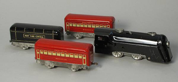 Appraisal: Marx articulated Engine Set Early Marx engine with passenger cars