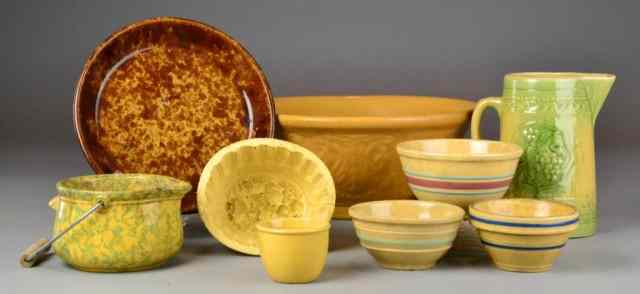 Appraisal: Yellow ware Bennington-Style PotteryA collection of late th century pottery