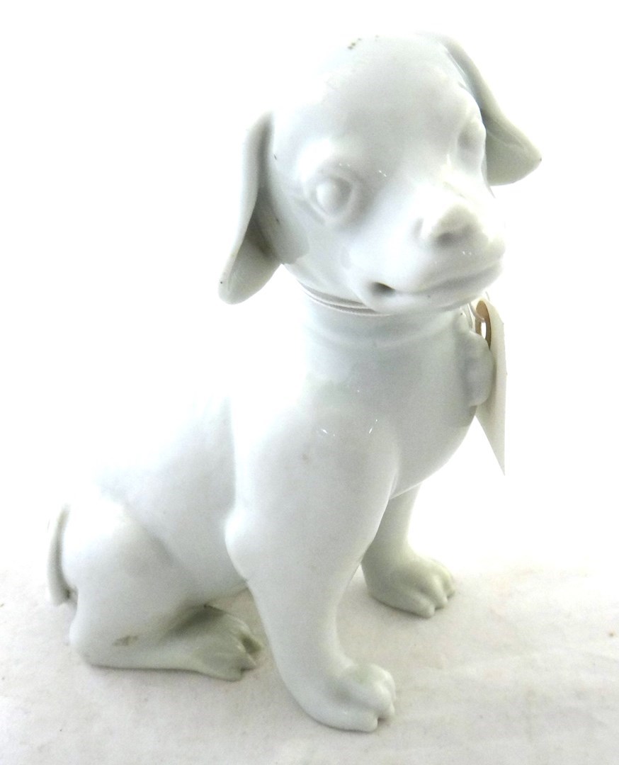 Appraisal: A Chinese white-glazed figure of a hound late th th