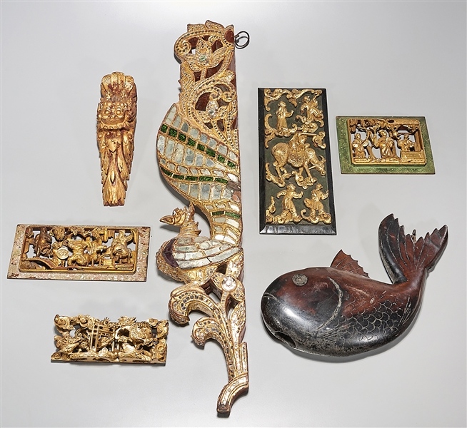 Appraisal: Group of Japanese wood carvings including gilt and painted wall