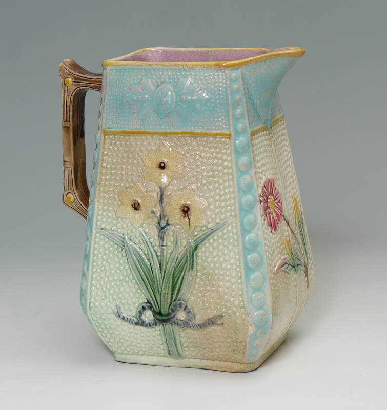 Appraisal: SQUARE MAJOLICA WATER PITCHER Polychrome glaze with stippled and floral