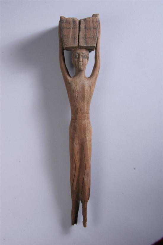 Appraisal: RARE EGYPTIAN WOOD FIGURE Circa - B C Holding a