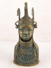 Appraisal: An African cast bronze torso with ceremonial headgear and jewellery