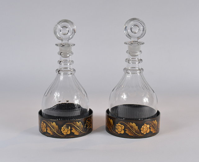 Appraisal: A pair of glass decanters th Centurywith ring stoppers with