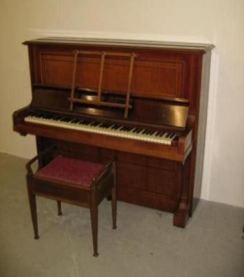 Appraisal: AN UPRIGHT PIANO by C Bechstein in mahogany case with