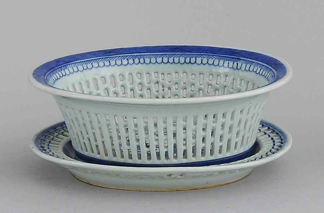 Appraisal: CHINESE EXPORT CANTON PORCELAIN OVAL CHESTNUT BASKETWith matching undertray In