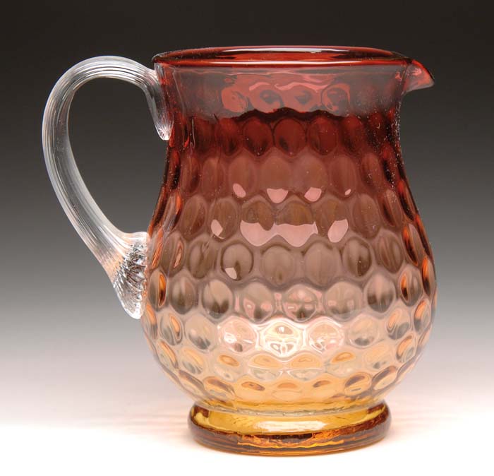 Appraisal: AMBERINA PITCHER I T P with applied clear reeded handle