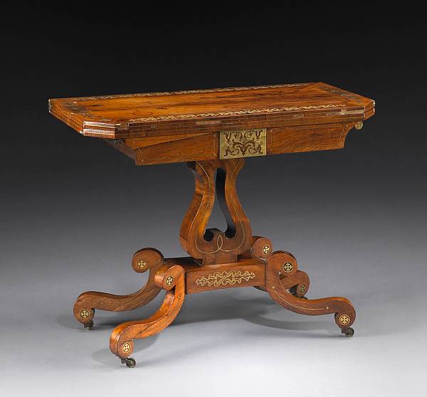 Appraisal: A Regency rosewood and brass inlaid games table early th