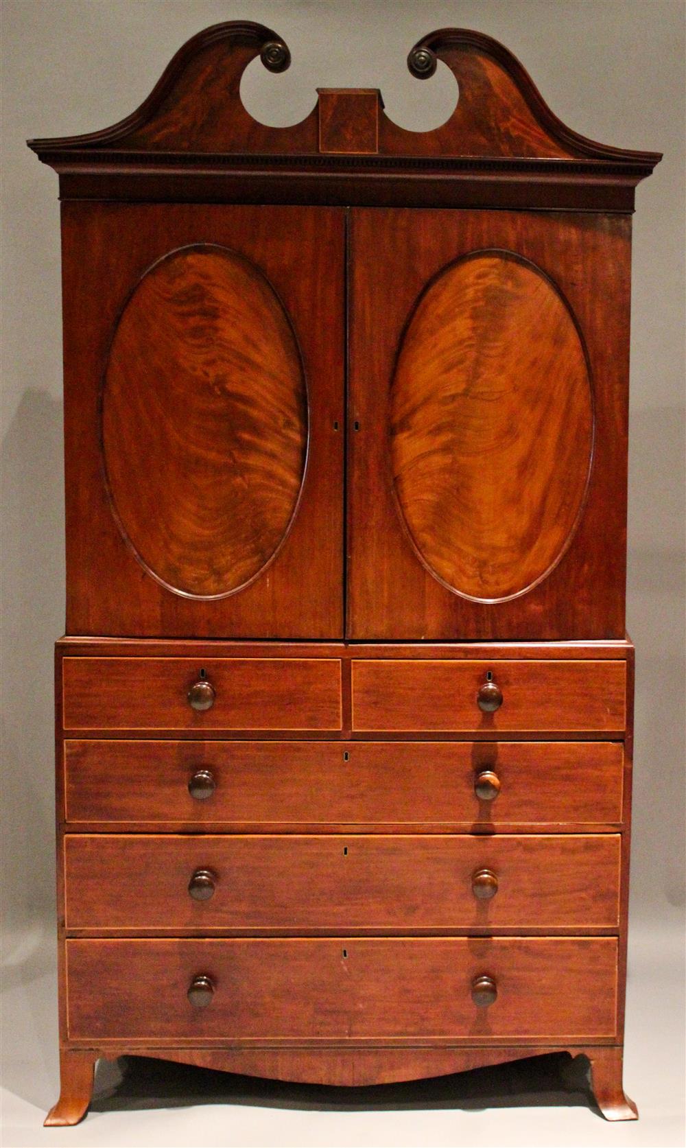 Appraisal: SOUTHERN MAHOGANY INLAID LINEN PRESS WITH SCROLL PEDIMENT TOP AND