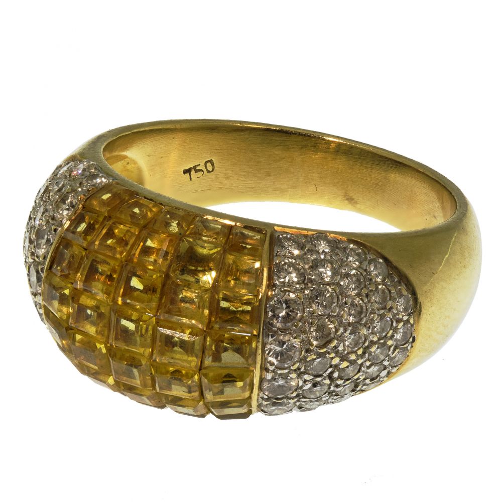 Appraisal: K YELLOW GOLD YELLOW TOPAZ AND DIAMOND RINGDome style having