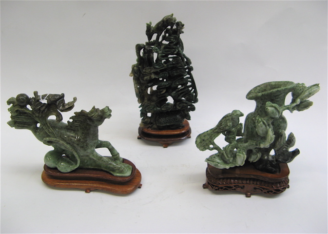 Appraisal: THREE CHINESE CARVED HARDSTONE JADE SCULPTURES various designs and symbology