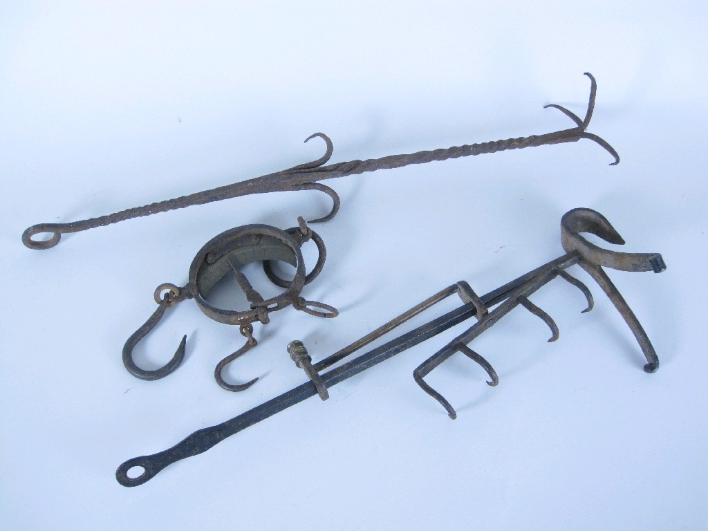 Appraisal: A brass and steel adjustable Spit a steel Game Hanger