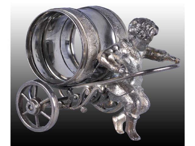 Appraisal: Boy Pulling Figural Napkin Ring on Wheels Description No manufacturer's