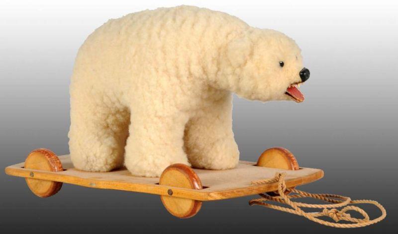 Appraisal: Polar Bear Pull Toy on Wooden Base Description Polar bear