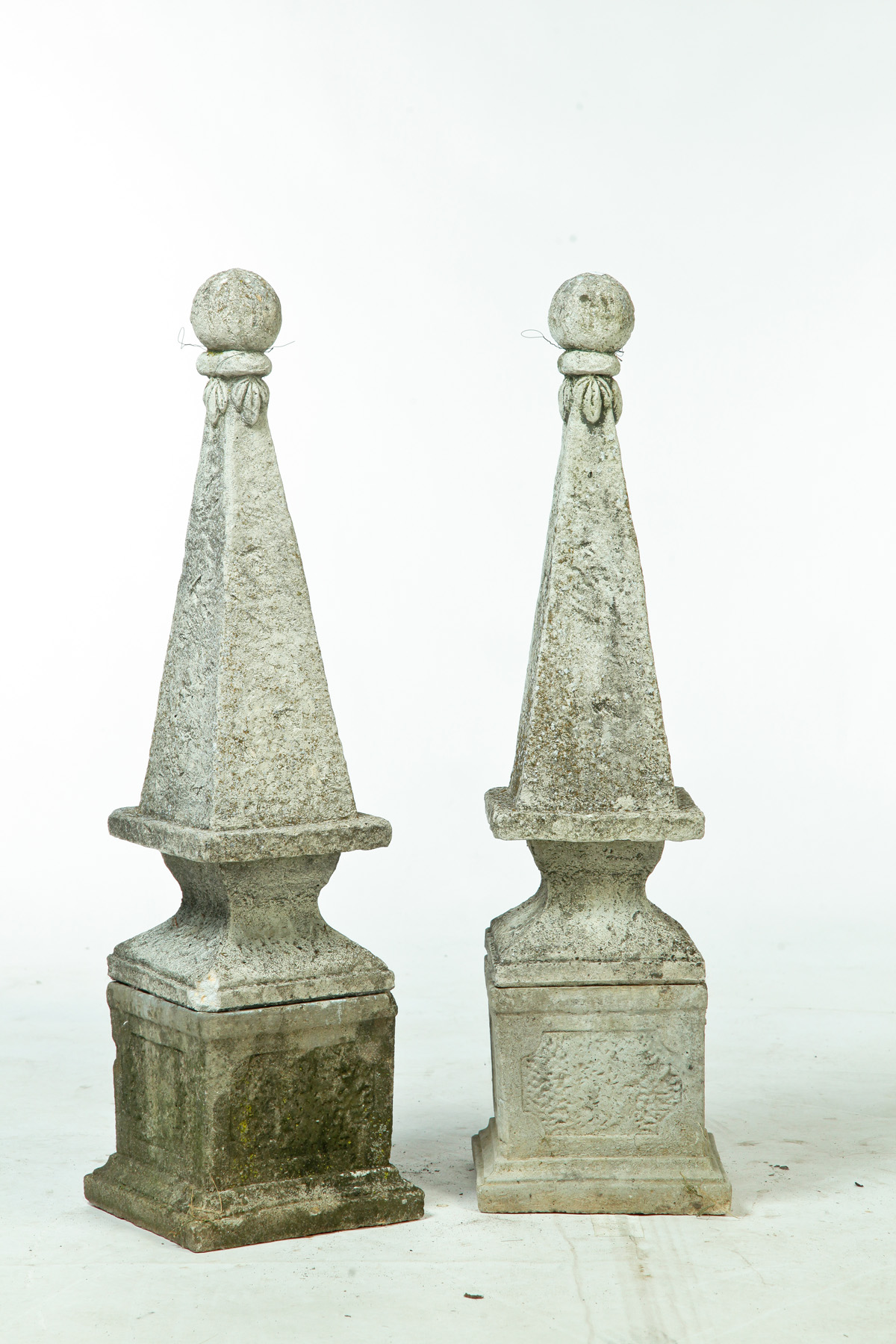 Appraisal: PAIR OF OBELISK WITH BALL FINIALS ON SQUARE PEDESTALS American