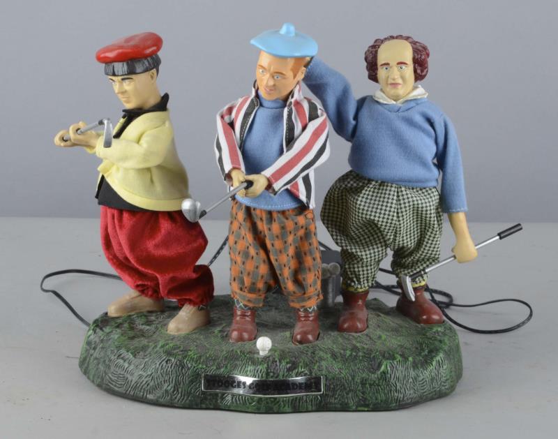 Appraisal: Three Stooges Golf Academy Automaton This battery operated electric display