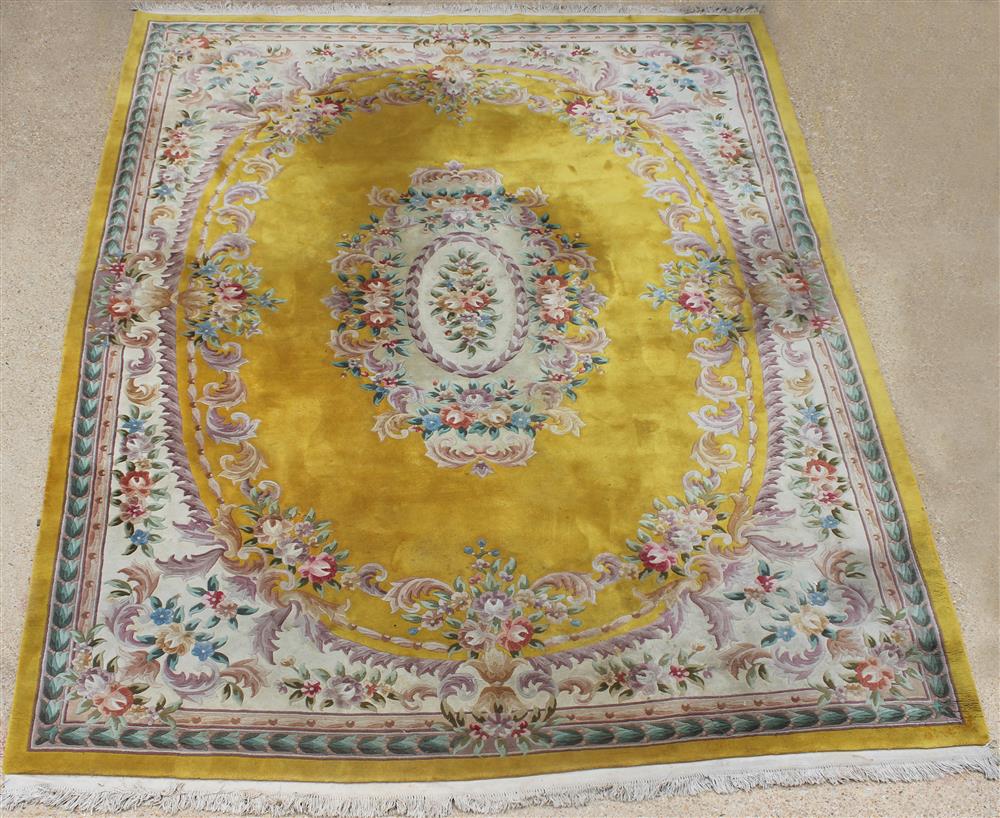 Appraisal: LARGE CHINESE FLORAL MEDALLION CARVED WOOL RUG colors include greens