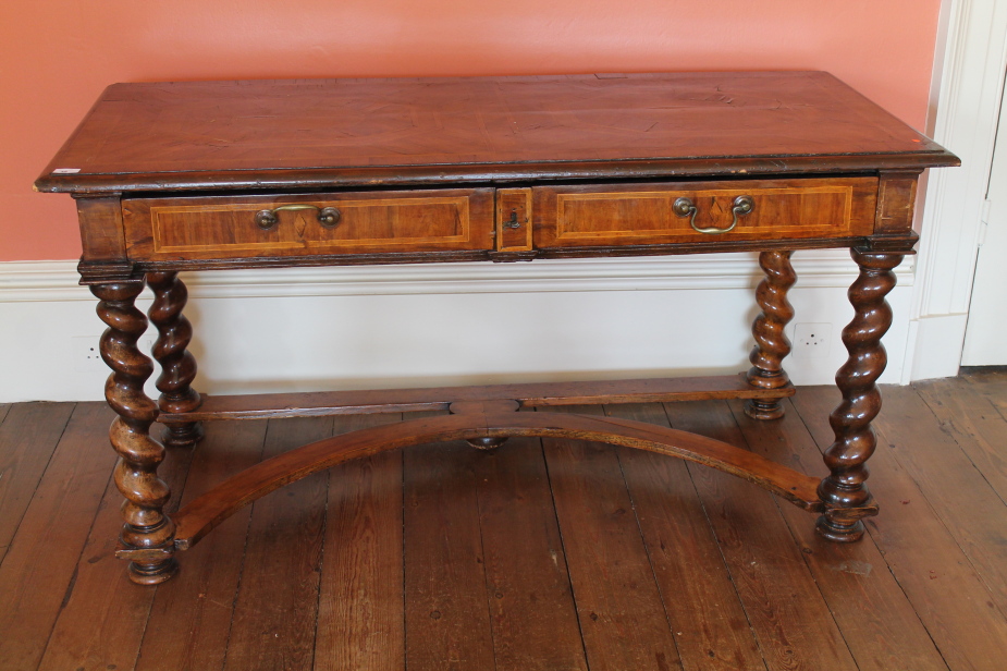 Appraisal: An thC and later walnut serving table with cross-banded top