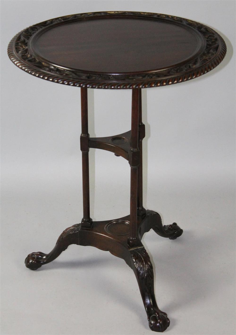 Appraisal: GEORGE III STYLE MAHOGANY SIDE TABLE the circular top with