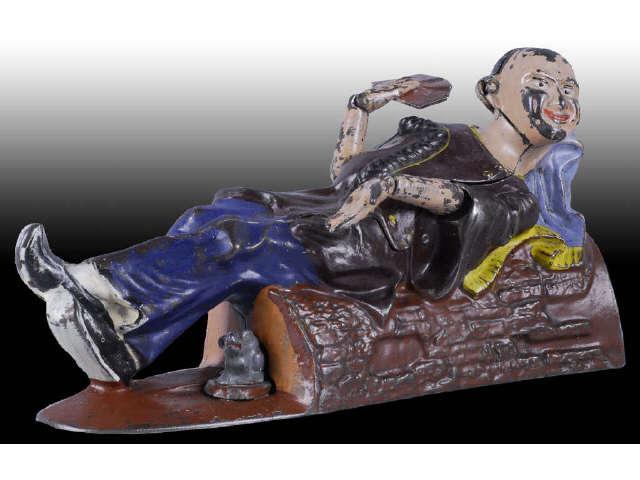 Appraisal: Cast Iron Reclining Chinaman Mechanical Bank Description J E Stevens