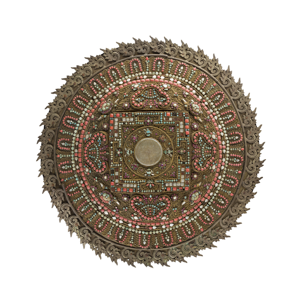 Appraisal: NEPALESE GILT METAL AND JEWELLED PANEL formed in concentric circles