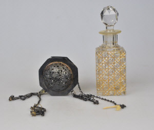 Appraisal: A th century gilt decorated cut glass scent bottle to