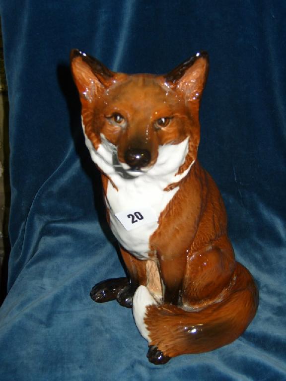 Appraisal: A Beswick Fireside model of a seated fox with impressed