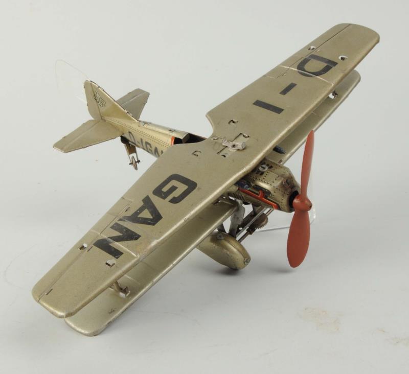 Appraisal: German Tin Litho Wind-Up Tippco Bomber Airplane Marked D-IGAN on