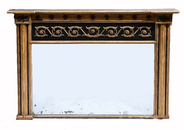 Appraisal: A REGENCY GILTWOOD OVERMANTEL MIRROR with fluted pilasters acanthus scrolling